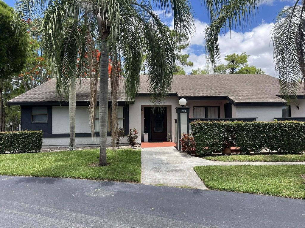 Photo of 325 Pennington Court, Royal Palm Beach, FL 33411 (MLS # B26040136)
