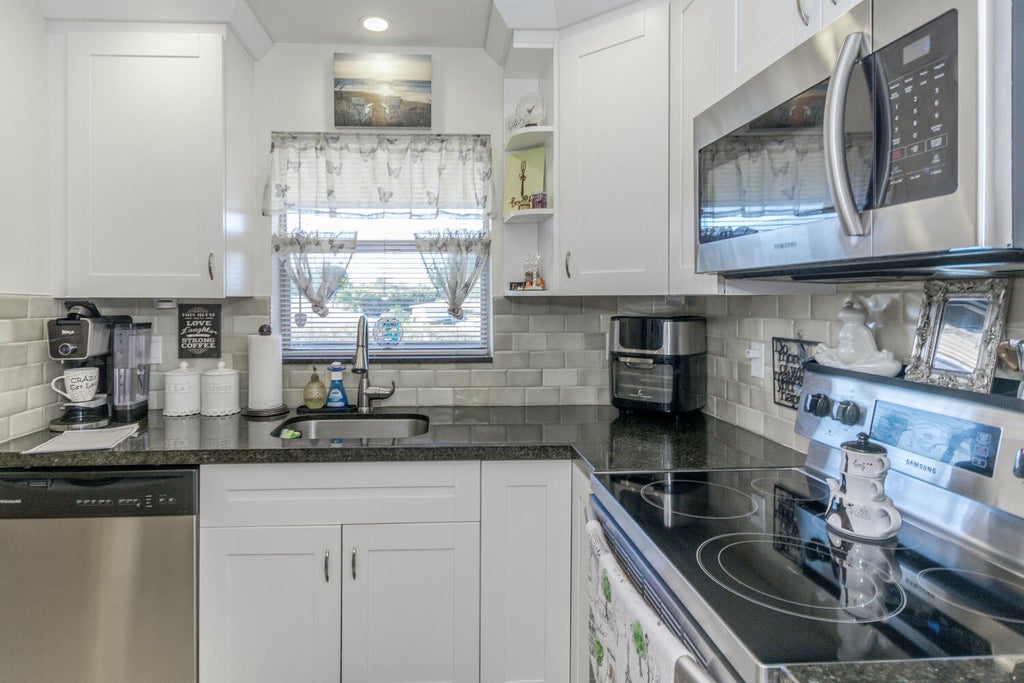 Photo of 2755 W Atlantic Avenue #208-B, Delray Beach, FL 33445 (MLS # R11051742)