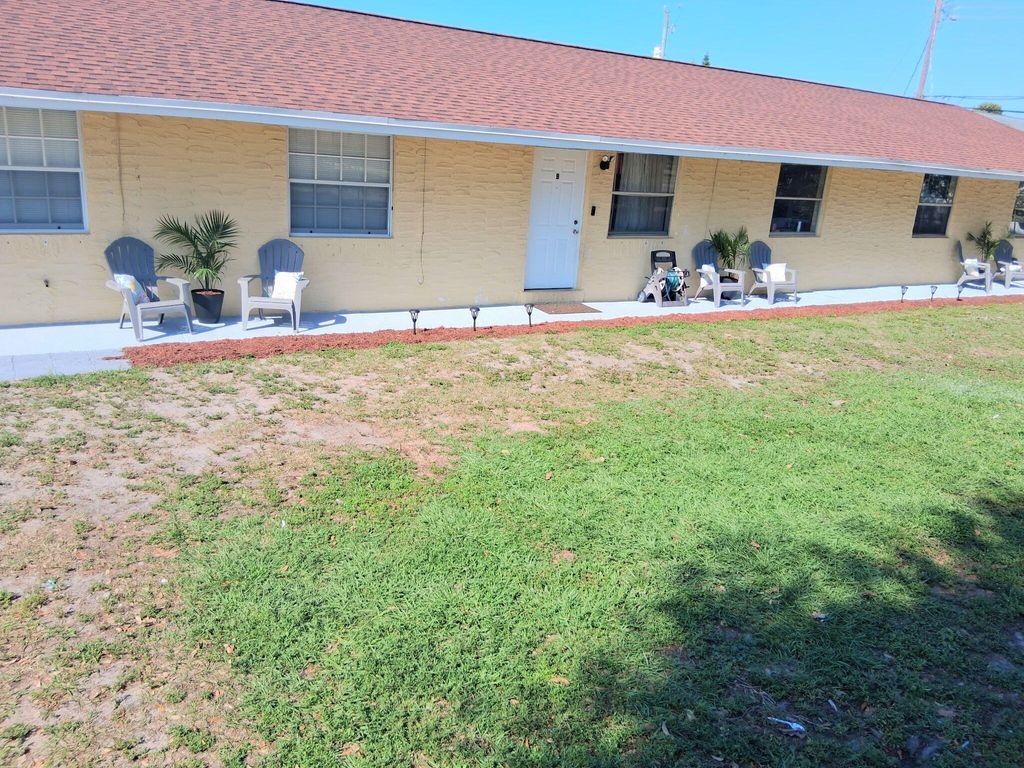 Photo of 420 Fleming Avenue, Greenacres, FL 33463 (MLS # B26008972)
