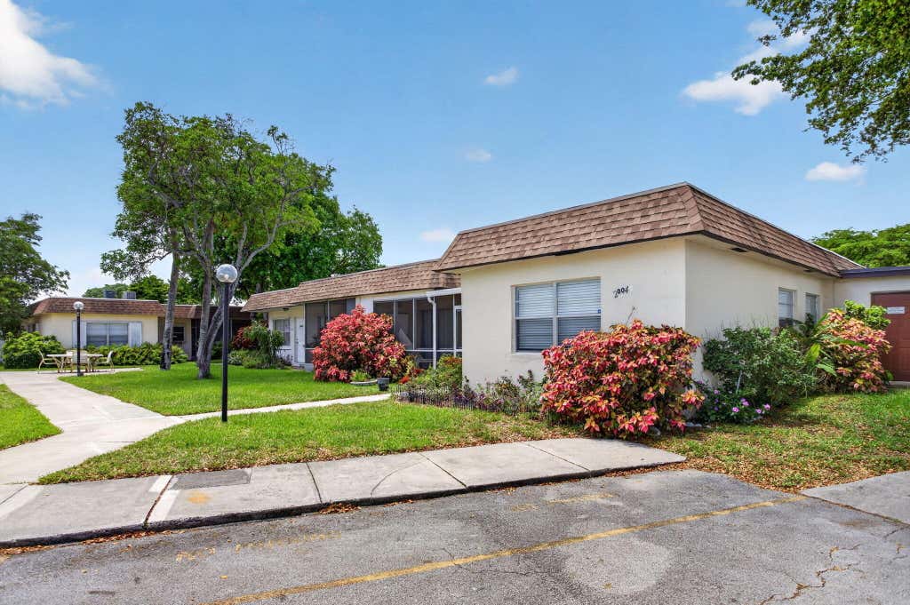 Photo of 2004 SW Natura Boulevard #D, Deerfield Beach, FL 33441 (MLS # B26042176)