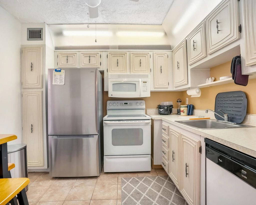 Photo of 2851 Somerset Dr #205, Lauderdale Lakes, FL 33311 (MLS # F10542530)