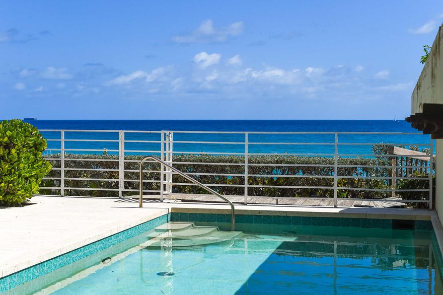 DIRECT OCEANFRONT TOWNHOUSE at the Residences of Sloan's Curve, 5BR / 5BA, Approx. 5,935 Total Sq. Ft., Private Staircase to the Beach. Lounge at your Private Pool in front of the tropical blue Atlantic Ocean with Barbecue. Ocean views from all main rooms, very large Living Room, Dining Area, Large Master Suite & Baths with Oceanfront Balcony, Elevator. Rights to 5-Star Amenities: Beautiful Beach, Large Pool, Spa, Gym, Party Room, Six Lighted Clay Tennis Courts, 24 HR Gatehouse Security.