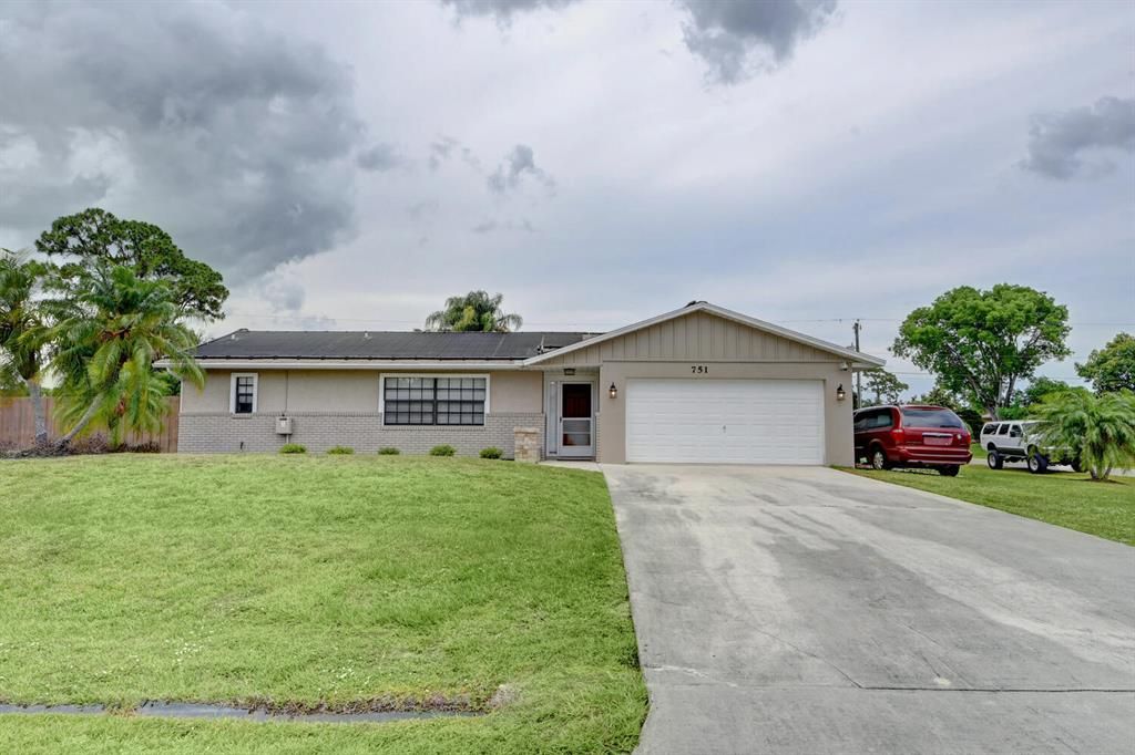 Photo of 751 SE Evergreen Terrace Ter, Port St Lucie, FL 34983 (MLS # R10715828)