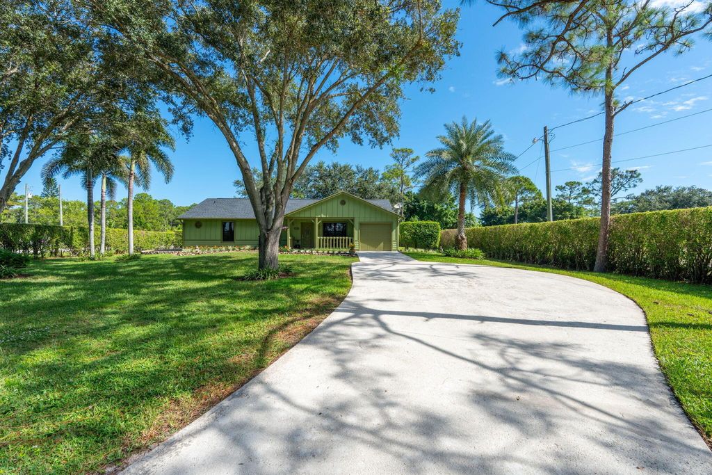 Photo of 11989 Persimmon Boulevard, West Palm Beach, FL 33411 (MLS # R11120695)