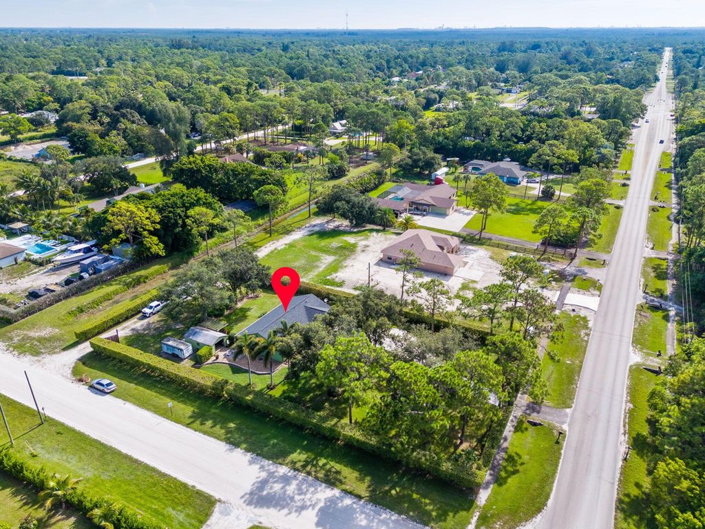 Photo of 11989 Persimmon Boulevard, West Palm Beach, FL 33411 (MLS # R11120695)