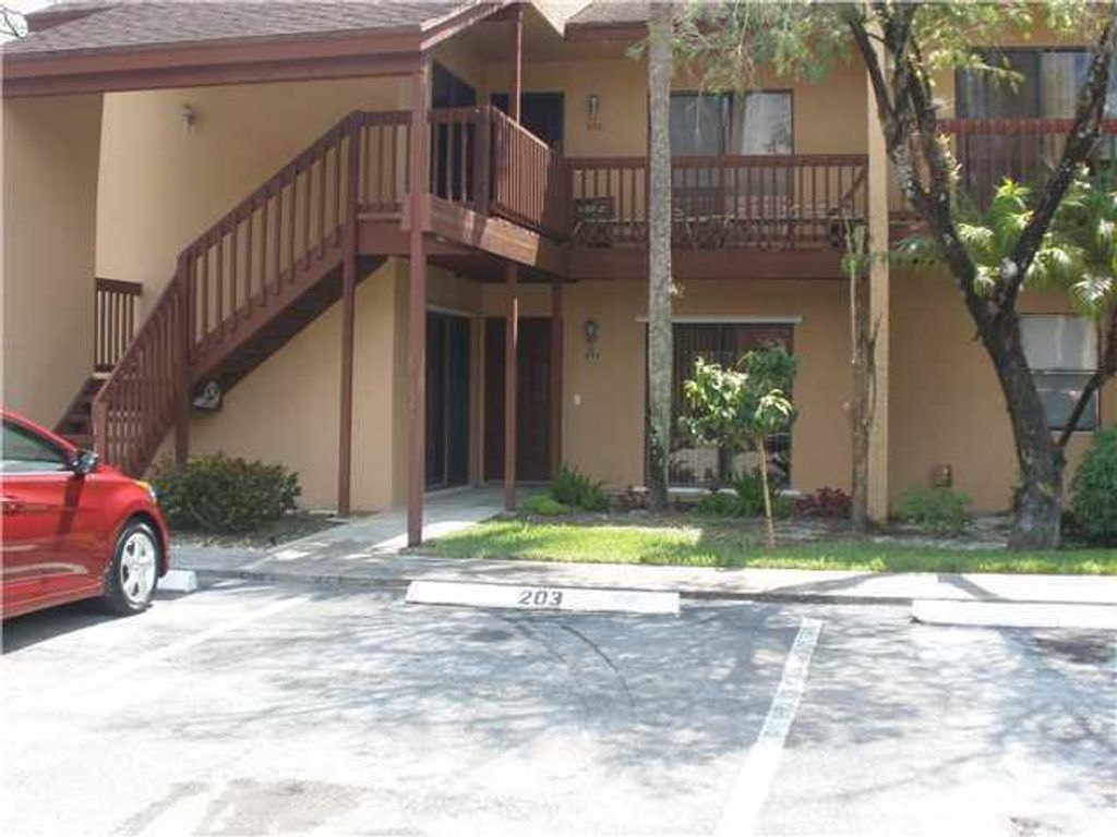 Photo of 203 E Lakeview Dr Drive E, Royal Palm Beach, FL 33411 (MLS # B26007918)