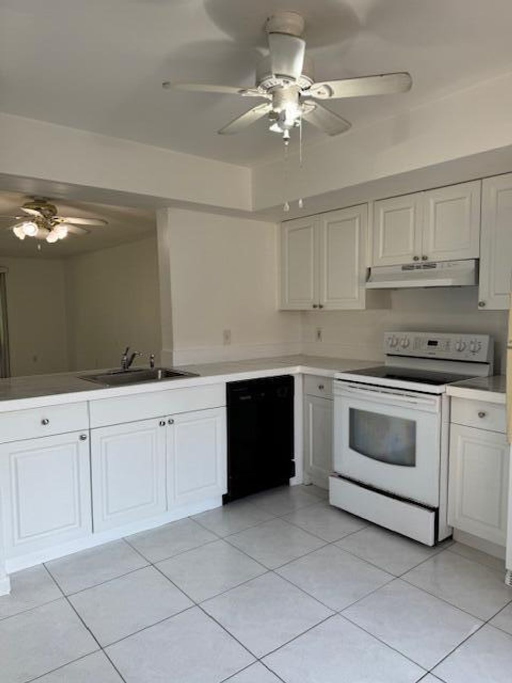 Photo of 203 E Lakeview Dr Drive E, Royal Palm Beach, FL 33411 (MLS # B26007918)