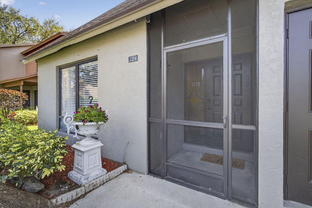 Photo of 326 Sandtree Drive, West Palm Beach, FL 33403 (MLS # R11165803)