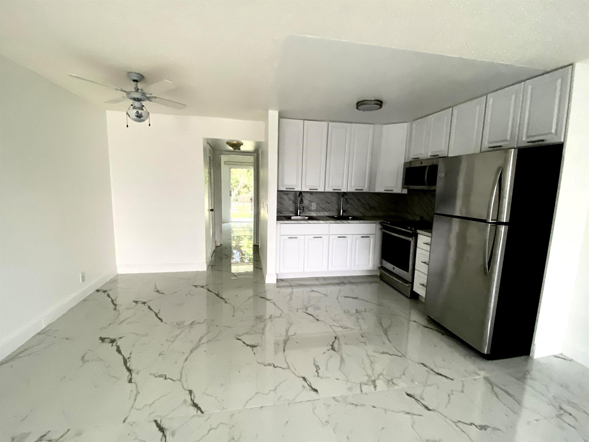Codo for rent in a 55+ community. Close to West gate, remodeled 1 BD, 1 Bath on the second floor. Beautiful all new floors, all new kitchen cabinets, new appliances, remodeled bath. You will enjoy many amenities of resort style living, like 1000 seat clubroom to watch shows and movies, indoor and outdoor pools, courtesy bus service, medical facilities, drug store, beauty shop, tennis, boating and more. Close proximity to PBI airport, restaurants, shops and beaches.