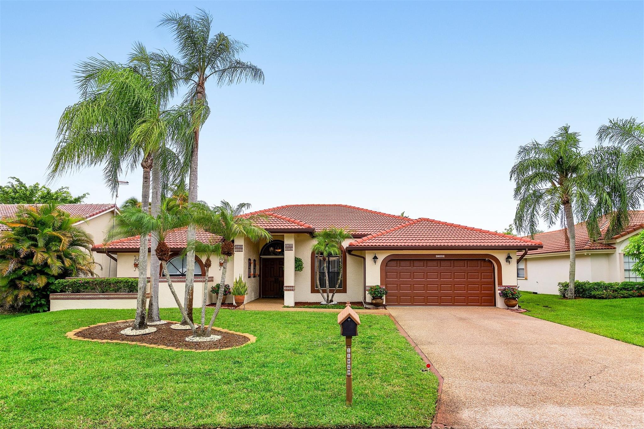 Your Private Oasis awaits! ENORMOUS 600 sq ft pool surrounded by a dense tree lined perimeter & gorgeous multi colored flowers creates an environment rarely available in C.S. premier WEST GLEN! Enter your home through impact resistant double doors & be greeted by a spacious open floor plan. 4 bdr 2.5 ba split plan boasting a totally remodeled luxury chef's kitchen featuring white quartz countertops, ss appliances & additional counter seating. Opulent primary bath is rivaled by the 2nd and 3rd bathrooms that would impress any luxury hotel! Entertain in your formal dining room or dine al fresco on the covered patio overlooking your tropical haven. Newer electrical panel, newly resurfaced pool & accordion shutters! WALKING DISTANCE TO HOUSES OF WORSHIP, & A Rated Riverside Elementary! PERFECT