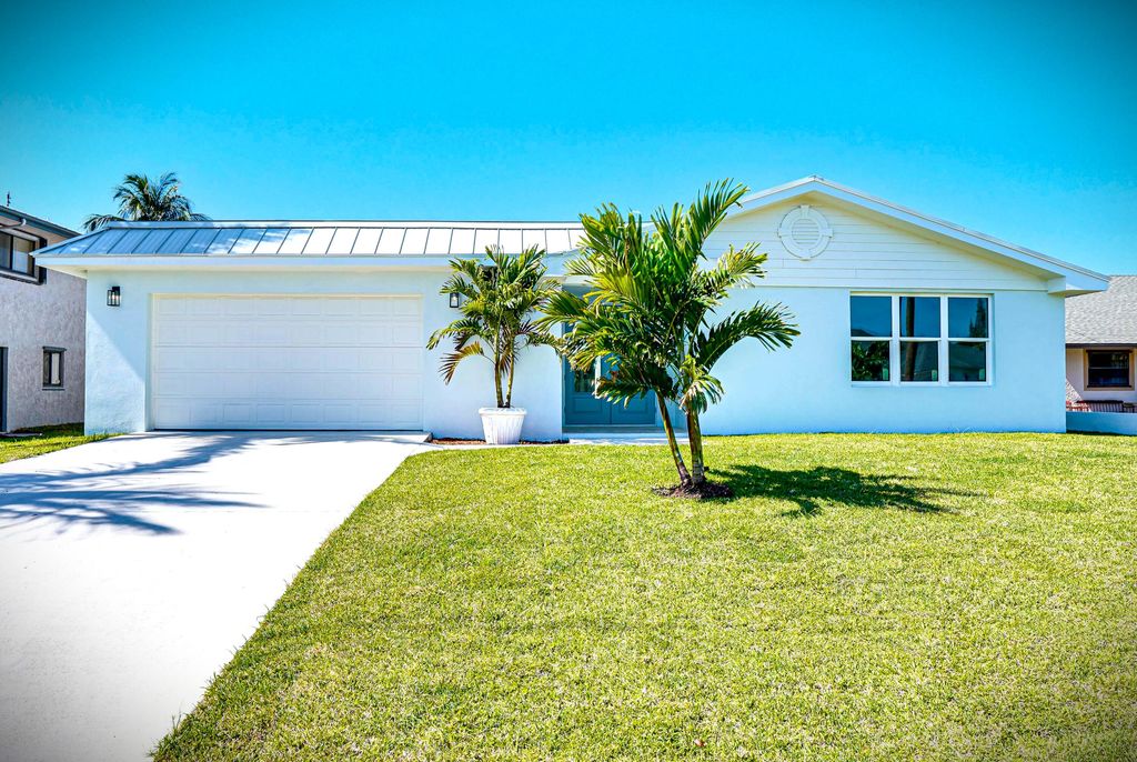 Photo of 1123 Granada ST, Hutchinson Island, FL 34949 (MLS # B26026762)