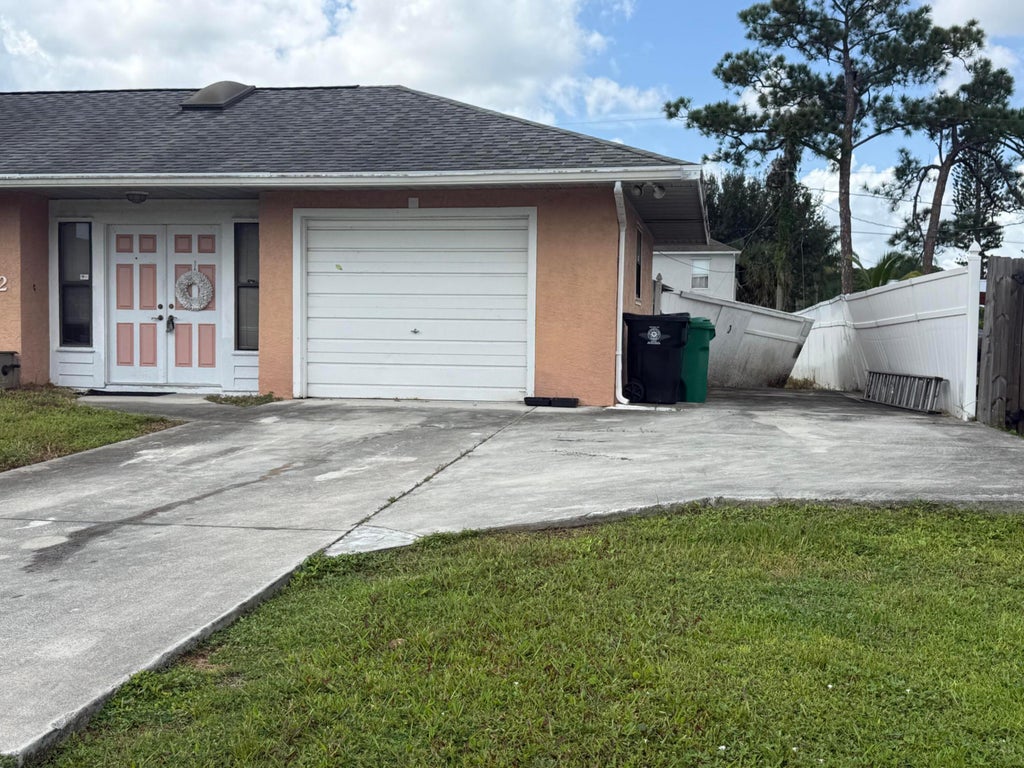 Photo of 1642 SE Ocean Lane, Port Saint Lucie, FL 34983 (MLS # B26075474)