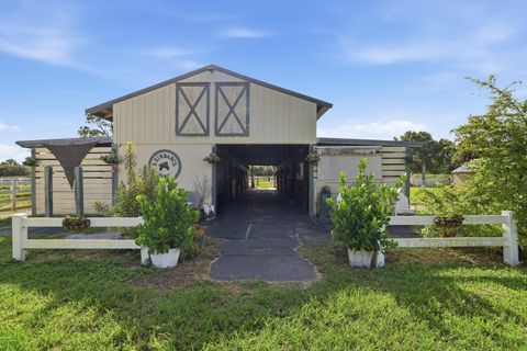 Tiny photo for 14095 BIDDEX Road, Loxahatchee Groves, FL 33470 (MLS # B26054226)
