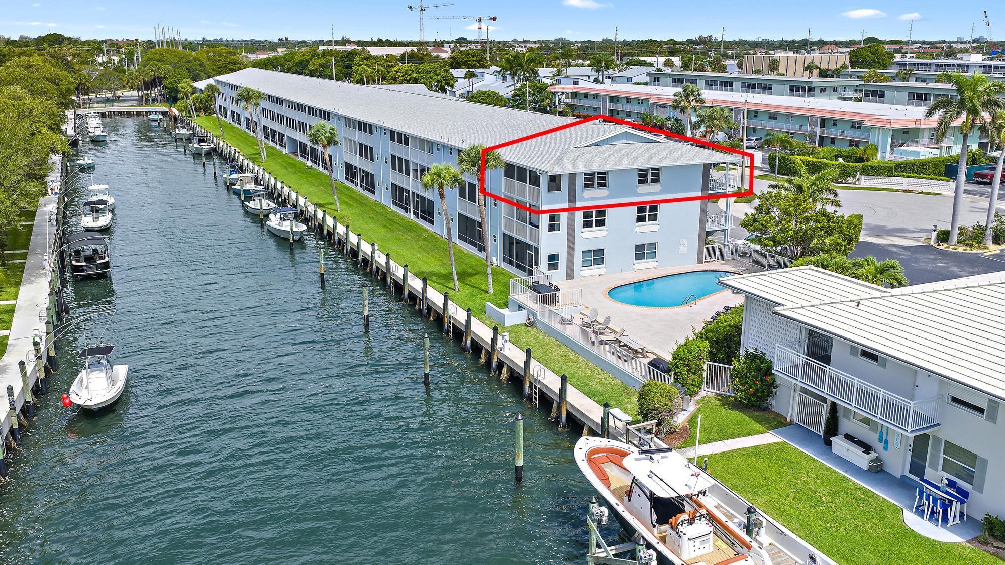 RARE opportunity to own this 3rd floor CORNER unit with breathtaking intracoastal views. Located in North Palm Beach just minutes to Peanut Island by boat. No fixed bridges- boat slips available $3 a linear ft. up to a 33ft boat. Live the waterfront lifestyle by fishing off the sea wall in your backyard or relaxing by the pool overlooking the intracoastal while feeling the ocean breeze. Excellent investment property or come and make it your own! Elevator in building. Washer and dryer included. Hurricane impact sliding door. Roof (2018), Exterior paint (2022), Repaved parking lot (2024).