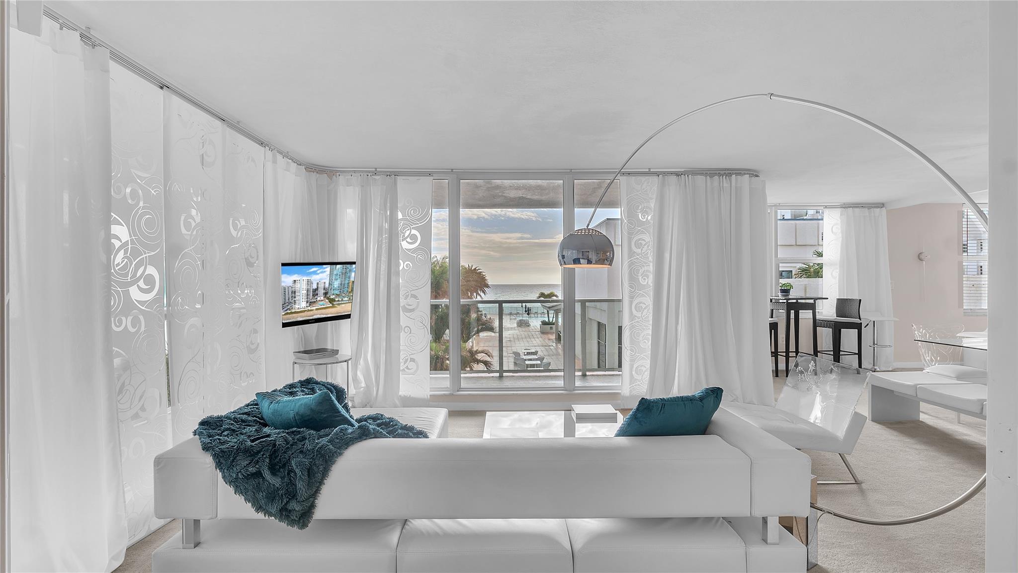 Discover unparalleled luxury in this captivating, nearly 1800 sqft condo. This exquisite unit comes fully furnished, ensuring a seamless living experience from day one. The versatile den has been converted into a dedicated workspace or potential 3rd bedroom, complete with 2 closets and its own door to the balcony.
Enjoy breathtaking intracoastal and direct ocean views from the expansive wrap-around balcony, perfect for watching the sunrise from the comfort of your new home. Step outside and walk directly onto the beach, embracing the ultimate coastal lifestyle.
The building offers a range of deluxe amenities, including an on-site Italian restaurant, two heated pools, a full gym, a beauty salon, a game room, a sauna, a steam room, beach service, and valet parking.
