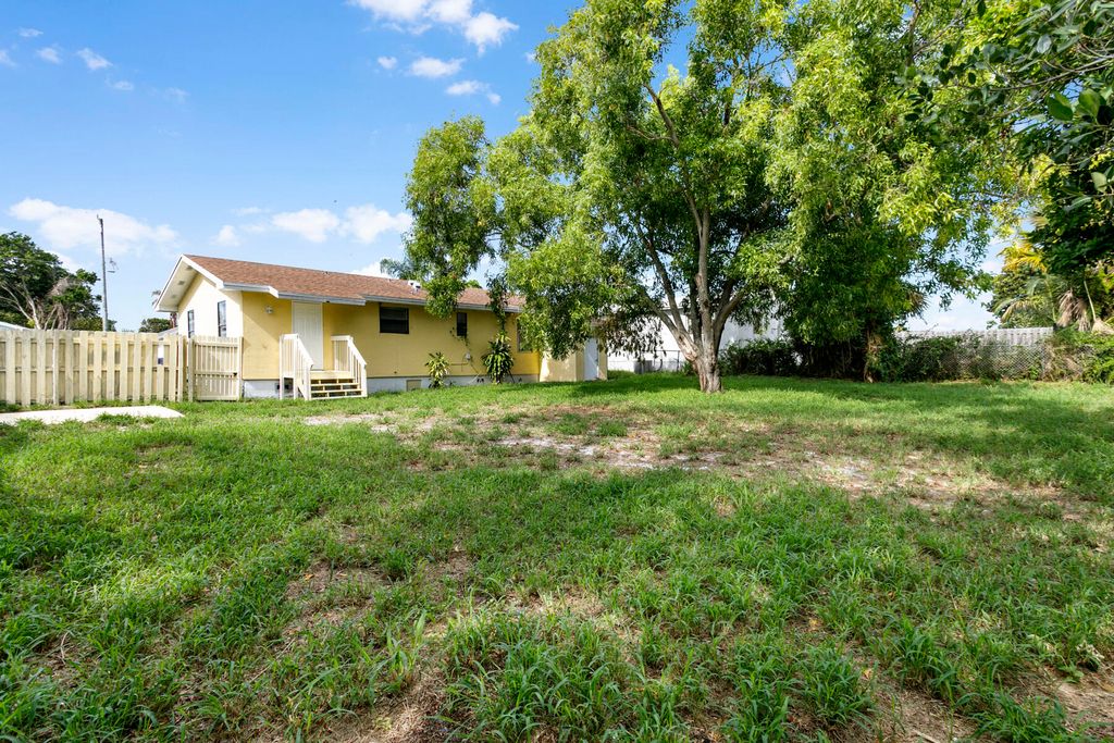 Photo of 1641 W 27th Street #D, Riviera Beach, FL 33404 (MLS # B26046320)