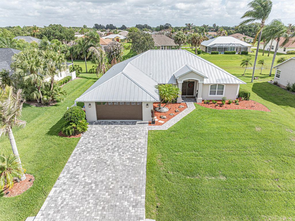 Photo of 4460 SW 12th Manor SW, Vero Beach, FL 32968 (MLS # B26030858)