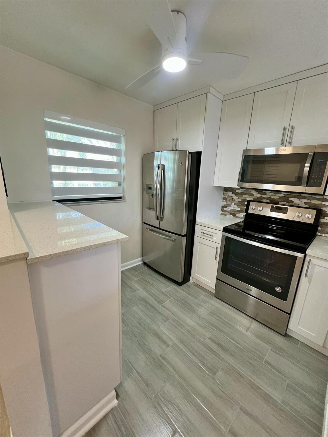 This beautifully maintained 2-bedroom, 2-bath condo offers comfort, convenience, and style. Step inside to a bright, open-concept living area featuring wood-like tile plank flooring throughout and modern finishes. The spacious primary suite includes a walk-in closet and private bath, while the second bedroom is perfect for guests or a home office. Enjoy a fully equipped kitchen, in-unit washer and dryer, and assigned parking. Residents have access to resort-style amenities including a sparkling pool, clubhouse, tennis courts, and walking paths. Conveniently located near shopping, dining, highways, and beaches, this home blends relaxation and accessibility. No pets per HOA. First, Last & Security Required.