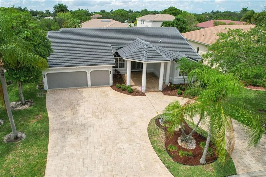 THIS IS THE HOME YOU HAVE BEEN WAITING FOR! AMAZING 4 BEDROOM 3 BATH POOL HOME ON CUL-DE-SAC WITH TRIPLE SPLIT FLOOR PLAN IN KENSINGTON GLEN! YOUR NEW HOME HAS BEEN NICELY UPDATED AND METICULOUSLY MAINTAINED BY ITS CURRENT OWNERS AND FEATURES A BEAUTIFUL WHITE KITCHEN WITH QUARTZ COUNTERS & NEWER STAINLESS STEEL APPLIANCES, LARGE SCALE NEUTRAL TILE FLOORS THROUGHOUT MAIN LIVING AREAS AND WOOD LOOK FLOORS IN BEDROOMS, BRAND NEW ROOF 2022 AND NEW A/C 2021, FRESHLY PAINTED EXTERIOR 2022, HUNTER DOUGLAS WINDOW TREATMENTS THROUGHOUT, AMAZING MASTER SUITE WITH SEPERATE CALIFORNIA CLOSETS, VANITIES, ROMAN TUB AND WALK THROUH SHOWER, THE FENCED BACK YARD FEATURES A FANTASTIC SCREENED IN POOL WITH RAISED SPA, OUTDOOR SHOWER AND PLENTY OF ROOM TO ENTERTAIN! HURRY THIS HOME IS PRICED TO SELL!