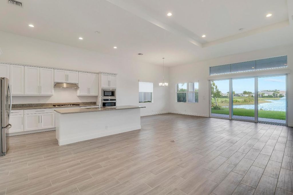 Photo of 9998 N Regency Way, Palm Beach Gardens, FL 33412 (MLS # R11149299)