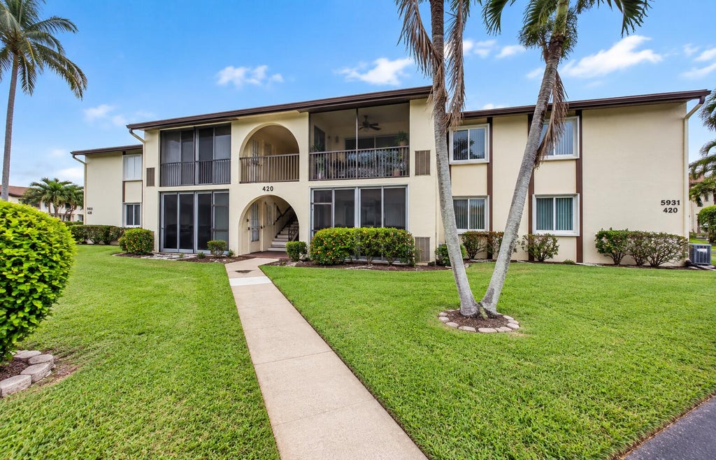 Photo of 5931 Whispering Pine Way #D-2, Greenacres, FL 33463 (MLS # B26080067)