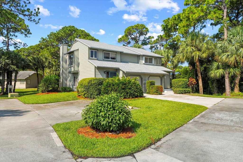 Photo of 616 NE Wax Myrtle Way, Jensen Beach, FL 34957 (MLS # R10989563)