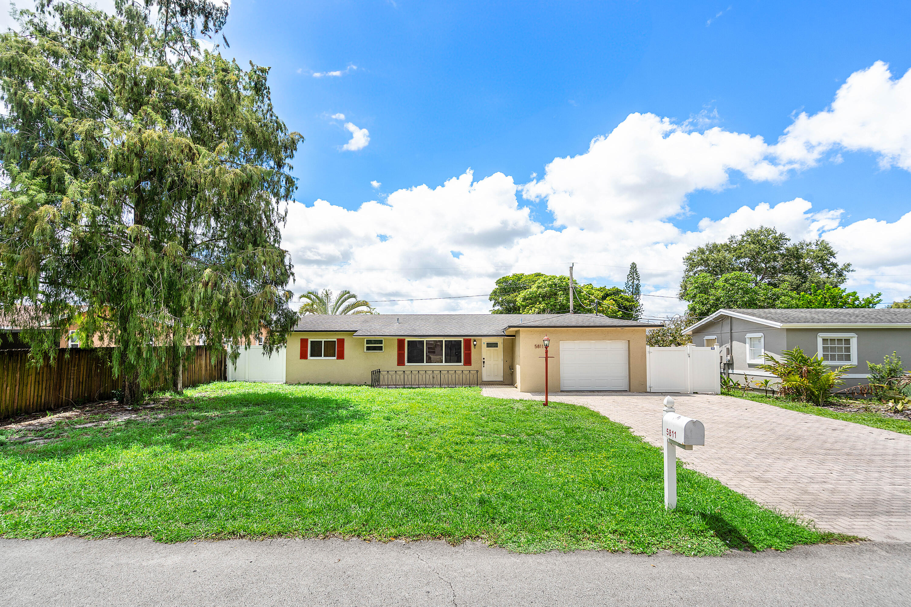 Welcome to this 3 bedroom, 2 full bathroom, 1 car attached garage, home that features a split layout and pool, perfect for buyers or tenants alike. Primary bedroom is en-suite with large walk in closet. A/C, water heater, appliances and washer/dryer have all been updated. Roof replaced in 2017/18, hurricane impact windows and doors throughout, and its proximity to the Hard Rock Casino, a premier entertainment and dining destination, ensures a steady stream of visitors and residents, making it ideal for short-term rentals, long-term leases, or redevelopment. Being situated in the heart of Davie, Florida, just minutes from the vibrant Hard Rock Hotel & Casino, this well-maintained property offers immense potential for investors seeking strong rental income.