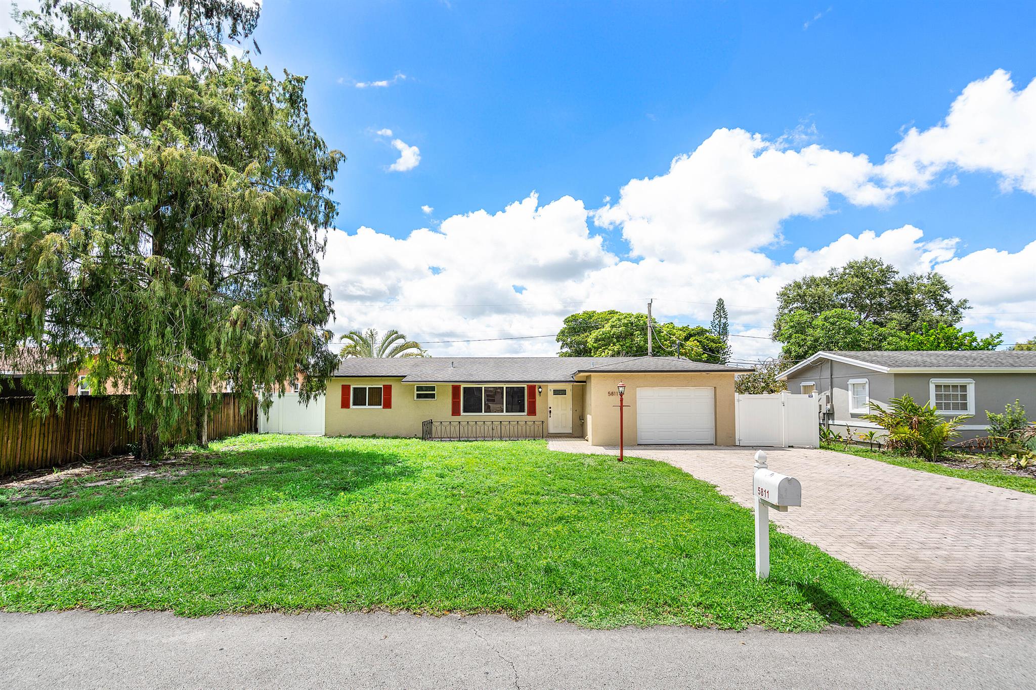 Welcome to this 3 bedroom, 2 full bathroom, 1 car attached garage, home that features a split layout and pool, perfect for buyers or tenants alike. Primary bedroom is en-suite with large walk in closet. A/C, water heater, appliances and washer/dryer have all been updated. Roof replaced in 2017/18, hurricane impact windows and doors throughout, and its proximity to the Hard Rock Casino, a premier entertainment and dining destination, ensures a steady stream of visitors and residents, making it ideal for short-term rentals, long-term leases, or redevelopment. Being situated in the heart of Davie, Florida, just minutes from the vibrant Hard Rock Hotel & Casino, this well-maintained property offers immense potential for investors seeking strong rental income.