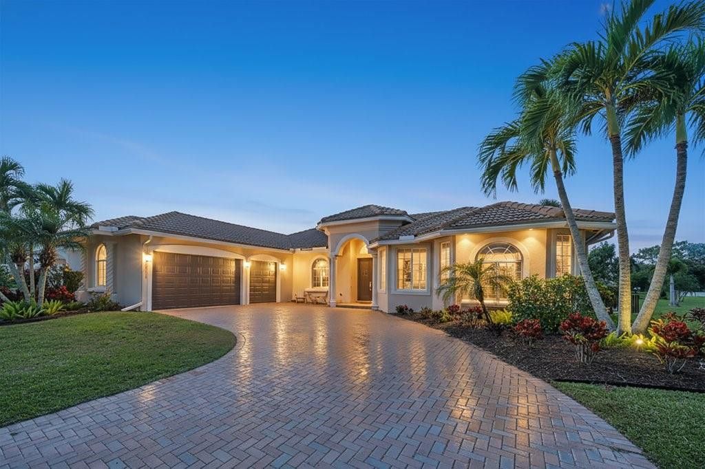 Photo of 2202 SW Golden Bear Way, Palm City, FL 34990 (MLS # F10549100)