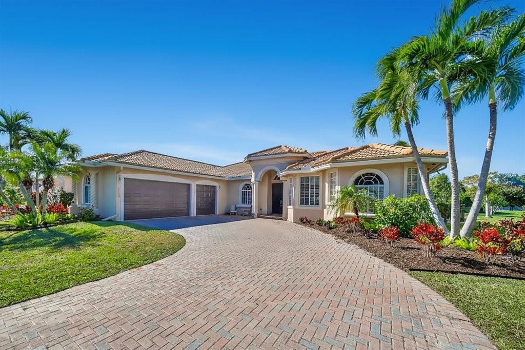 Photo of 2202 SW Golden Bear Way, Palm City, FL 34990 (MLS # F10549100)