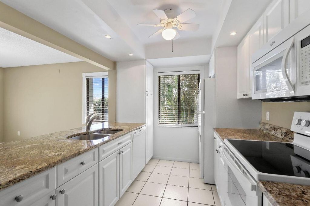 Photo of 2243 NW 22nd Avenue #106, Stuart, FL 34994 (MLS # R10960345)