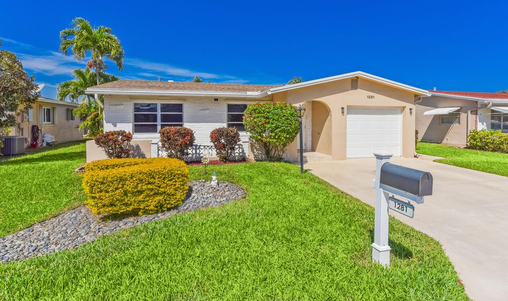 Photo of 1281 NW 45th Court, Deerfield Beach, FL 33064 (MLS # R11167914)