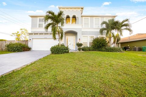 Photo of 1968 SW Monterrey Lane, Port Saint Lucie, FL 34953 (MLS # R11138145)