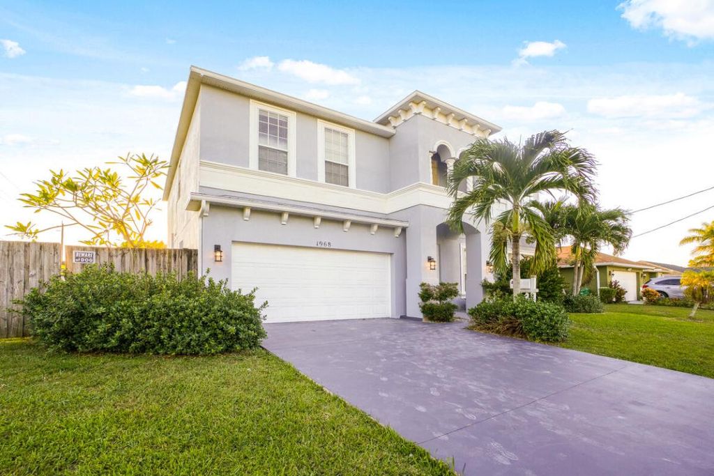 Photo of 1968 SW Monterrey Lane, Port Saint Lucie, FL 34953 (MLS # R11138145)