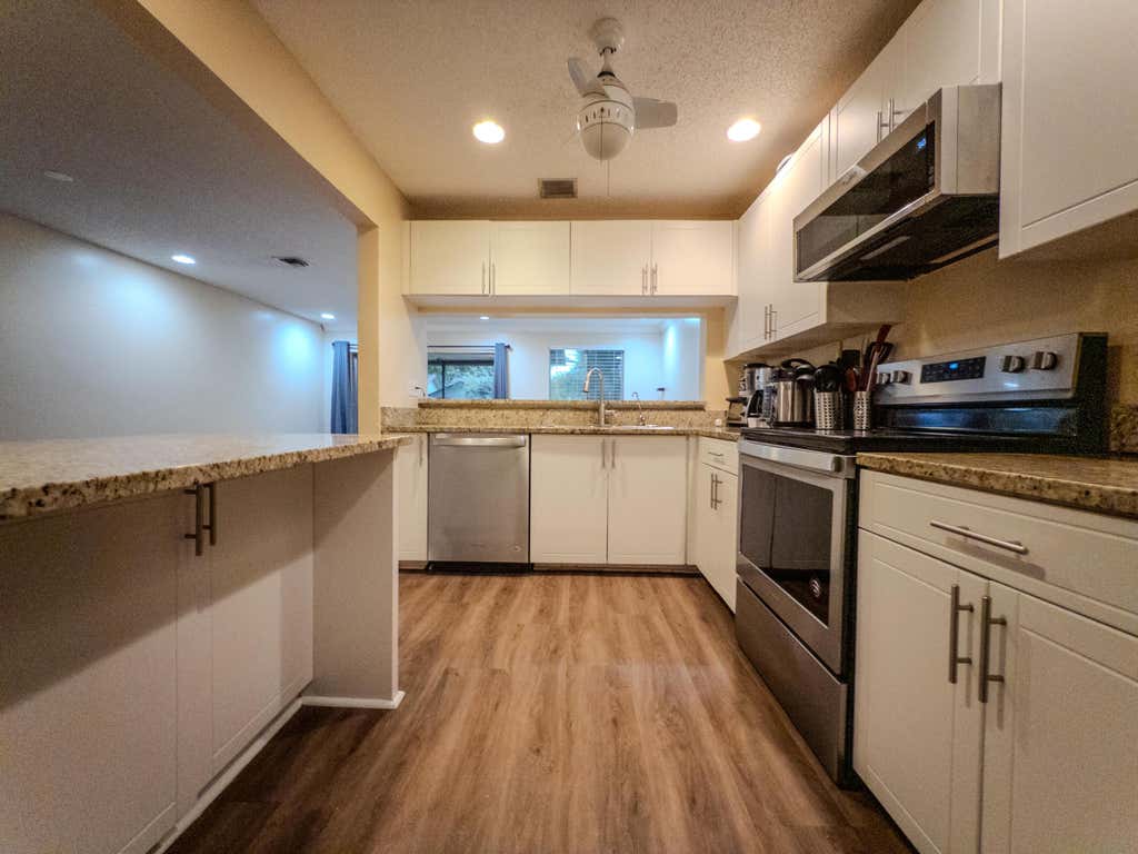 Photo of 2011 E Discovery Cir CIR E, Deerfield Beach, FL 33442 (MLS # B26041941)