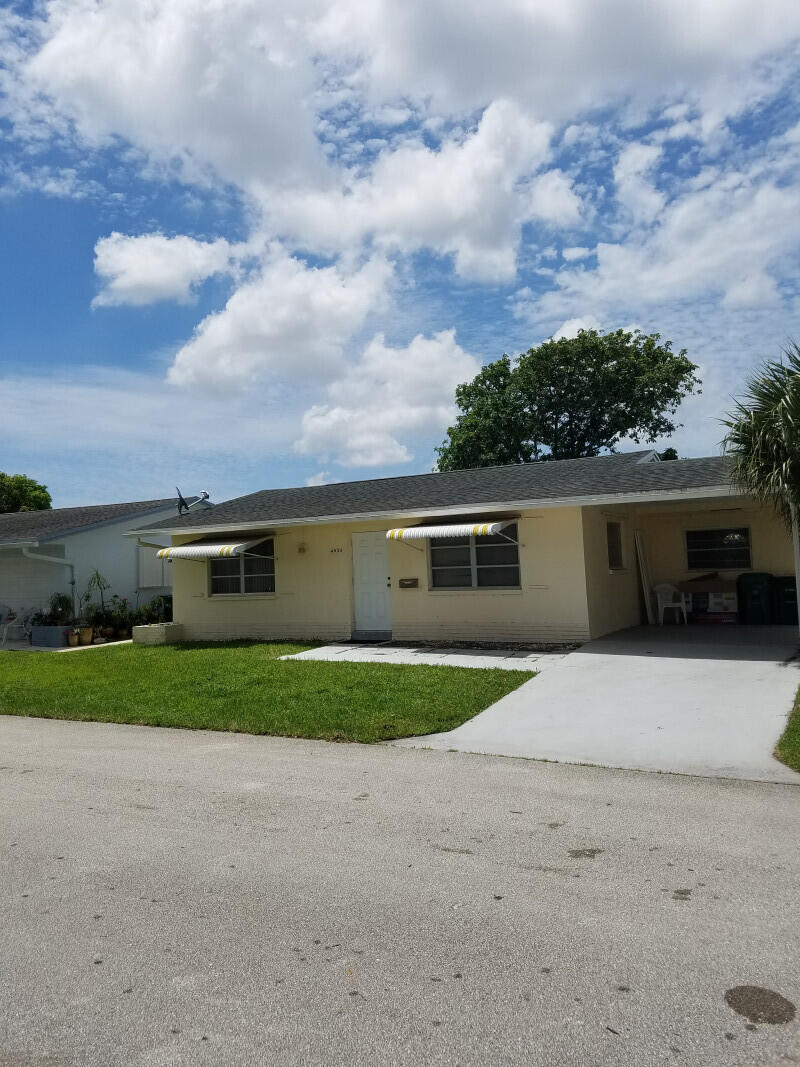 Photo of 4934 NW 55th Court, Tamarac, FL 33319 (MLS # B26056073)
