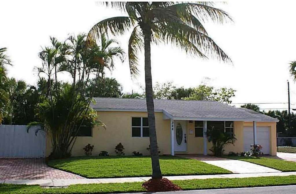 Photo of 324 BUNKER RANCH Road, West Palm Beach, FL 33405 (MLS # B26054956)