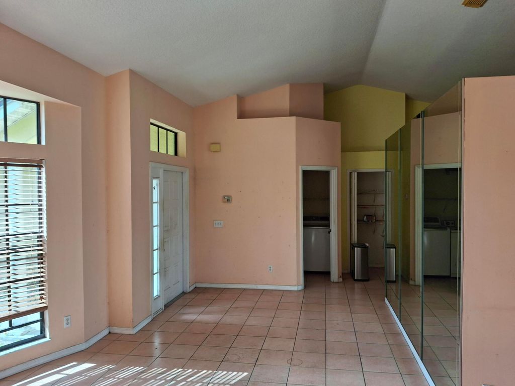 Photo of 5000 NW Erskin Terrace, Port Saint Lucie, FL 34983 (MLS # B26021277)