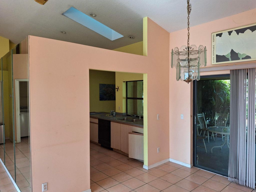 Photo of 5000 NW Erskin Terrace, Port Saint Lucie, FL 34983 (MLS # B26021277)