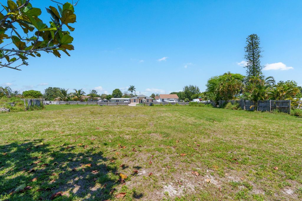 Photo of 661 Neptune Street, West Palm Beach, FL 33406 (MLS # R10976178)