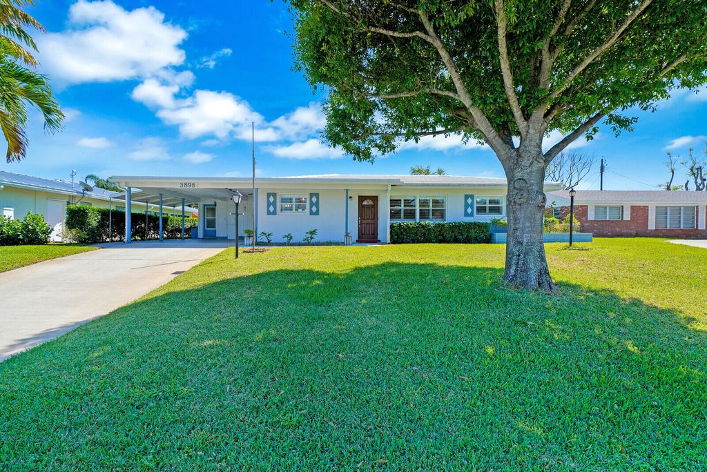 Photo of 3898 Carnation Circle N, Palm Beach Gardens, FL 33410 (MLS # R10787581)