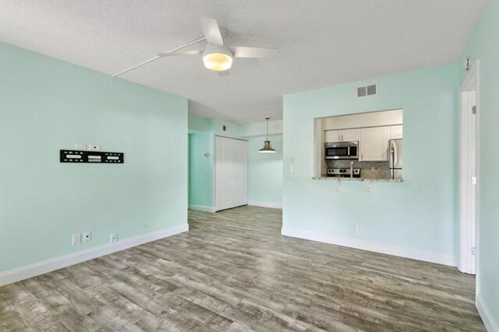 Photo of 6479 Chasewood Drive #B, Jupiter, FL 33458 (MLS # B26038084)