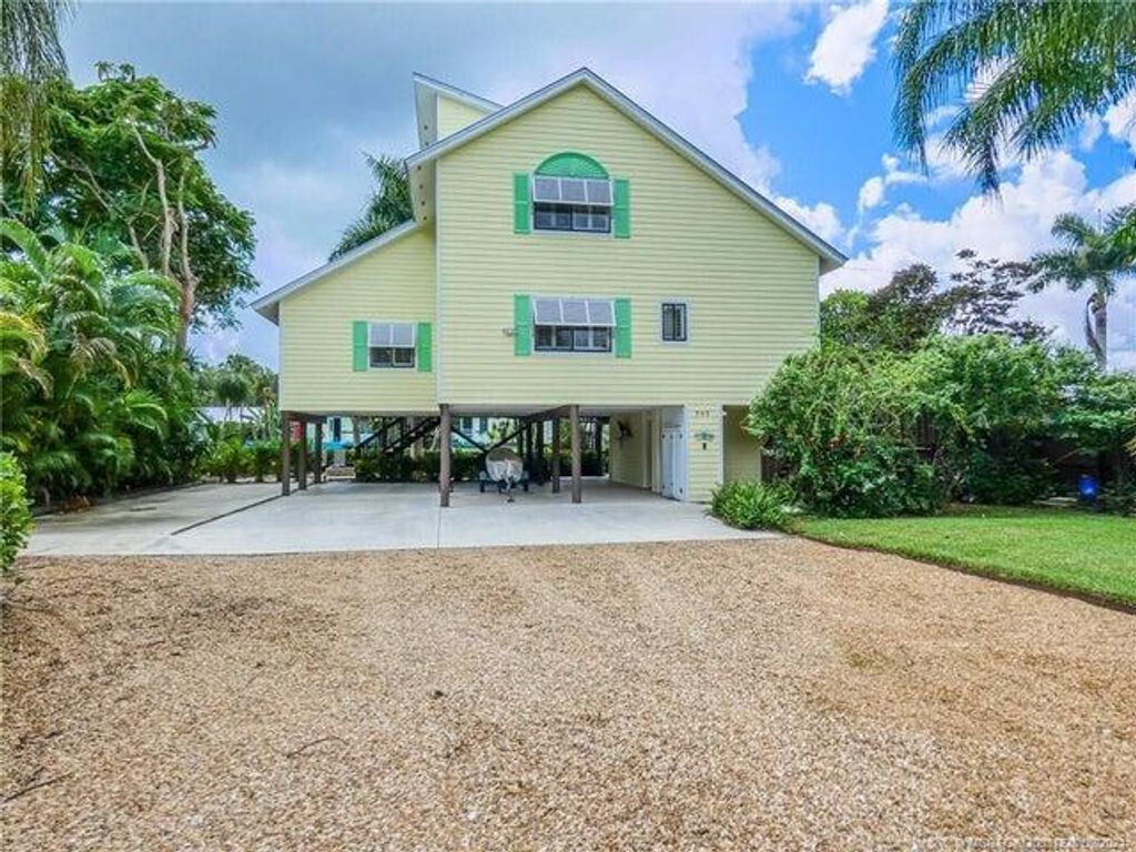 Photo of 765 SW Rustic Circle, Stuart, FL 34997 (MLS # R11056632)