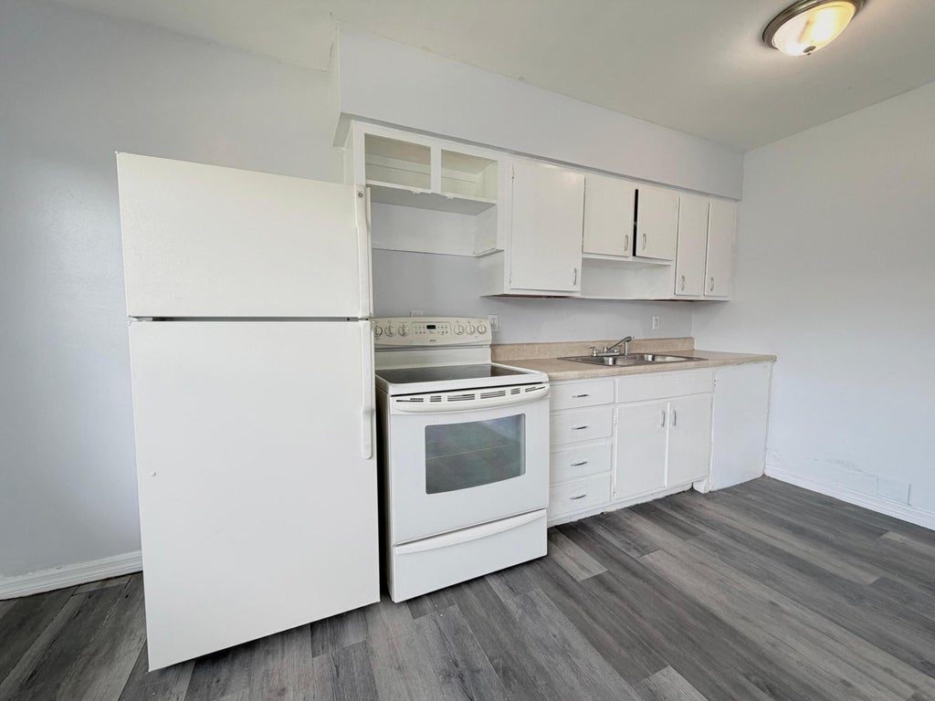Photo of 113 E 27th Street #A, Riviera Beach, FL 33404 (MLS # B26075753)