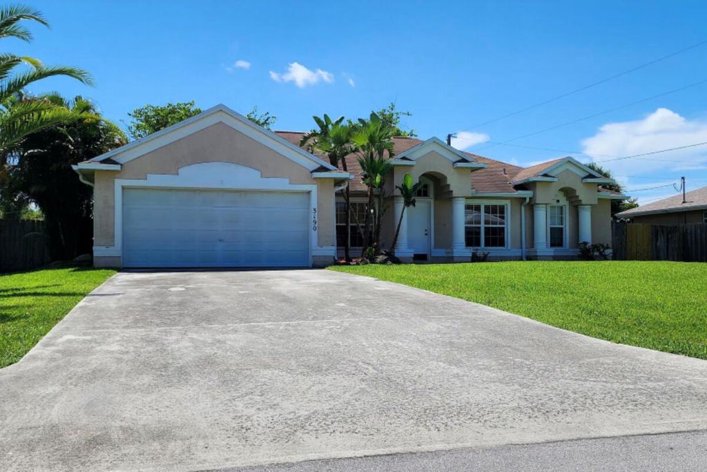 Photo of 3190 SW Armucher Street, Port Saint Lucie, FL 34953 (MLS # R11140987)