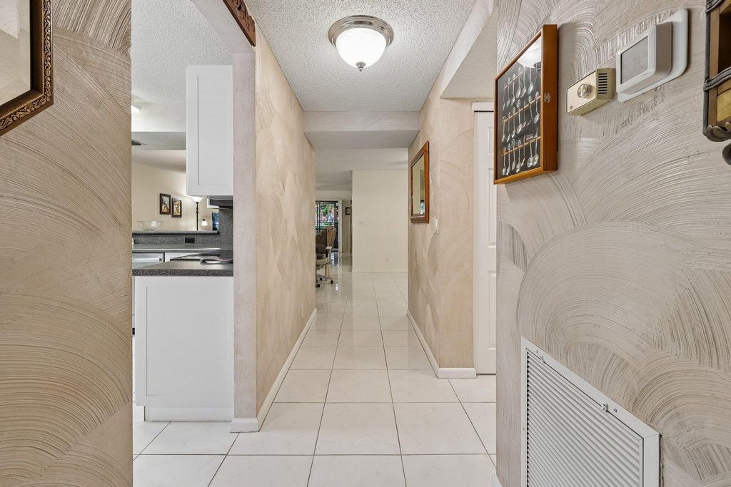 Photo of 9681 E Sills Dr DR E #102, Boynton Beach, FL 33437 (MLS # B26027615)