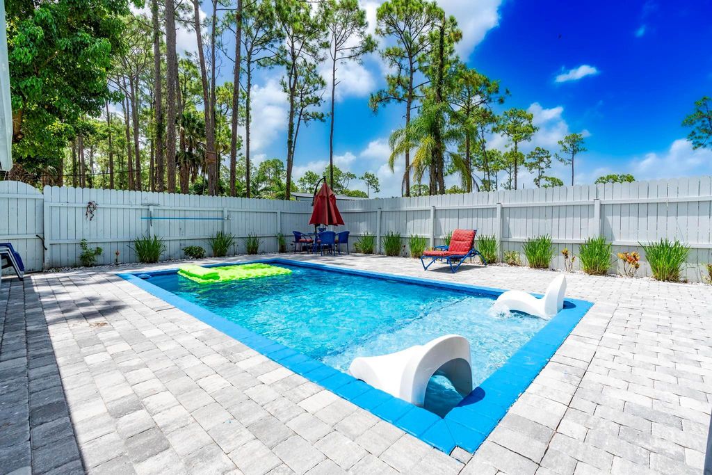 Photo of 15211 60th Place N, The Acreage, FL 33470 (MLS # R11110740)