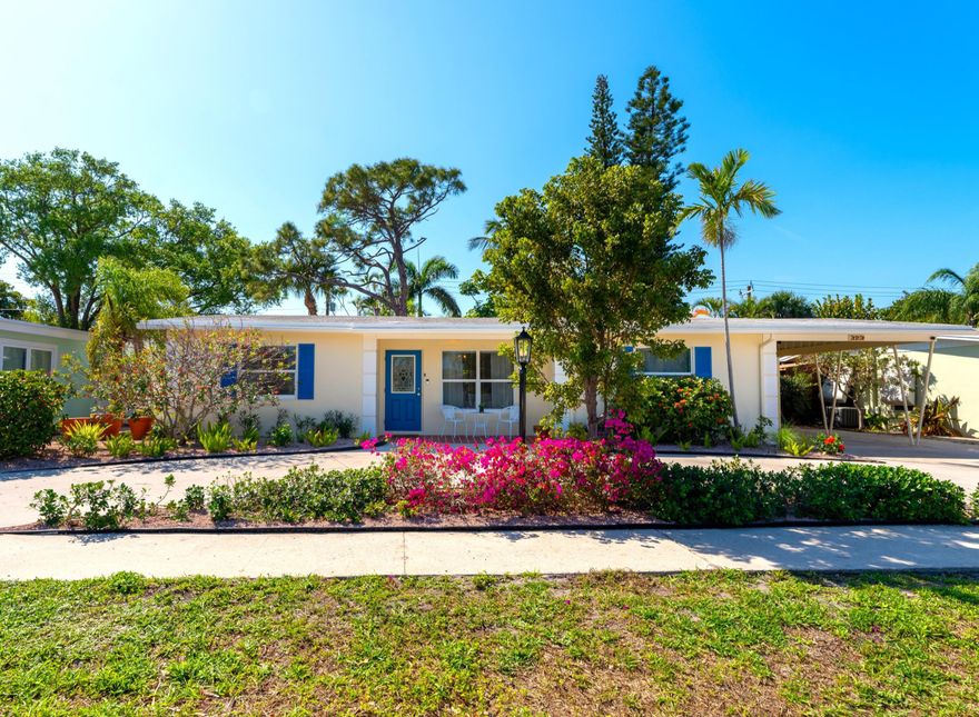Introducing Hideaway Cottage - a rare gem on a massive double lot in one of Lantanas most desirable quiet neighborhoods, just 3 blocks from the Intracoastal Waterway. This beautifully remodeled 3-bedroom, 3-bathroom home has been thoughtfully updated from top to bottom and is truly move-in ready. Recent upgrades include a brand-new roof, new electrical panel and wiring, new AC system, new water heater, impact-resistant hurricane windows, new appliances, and fully renovated bathrooms. Nothing is left to do, just bring your furniture and start living. Outside you'll find the expansive three-season porch overlooking a truly spectacular backyard oasis. The oversized lot features new pathways, hardscape lounge areas, and lush tropical landscaping with mature plants and trees, perfect for relaxing, entertaining, or simply enjoying Florida's outdoor lifestyle. Additional features include a private well that powers the sprinkler system (saving thousands annually on water bills), a large storage shed, a fully equipped kitchen, generous bedrooms, and a convenient laundry room. Parking is abundant with covered space for one vehicle plus a circular driveway accommodating four more cars. This unique, charming cottage offers the perfect blend of modern updates and relaxed Florida living. Don't miss this rare opportunity!