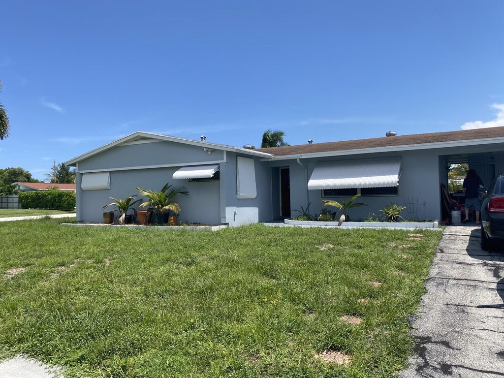 Photo of 3292 Collin Drive, West Palm Beach, FL 33406 (MLS # R11005890)
