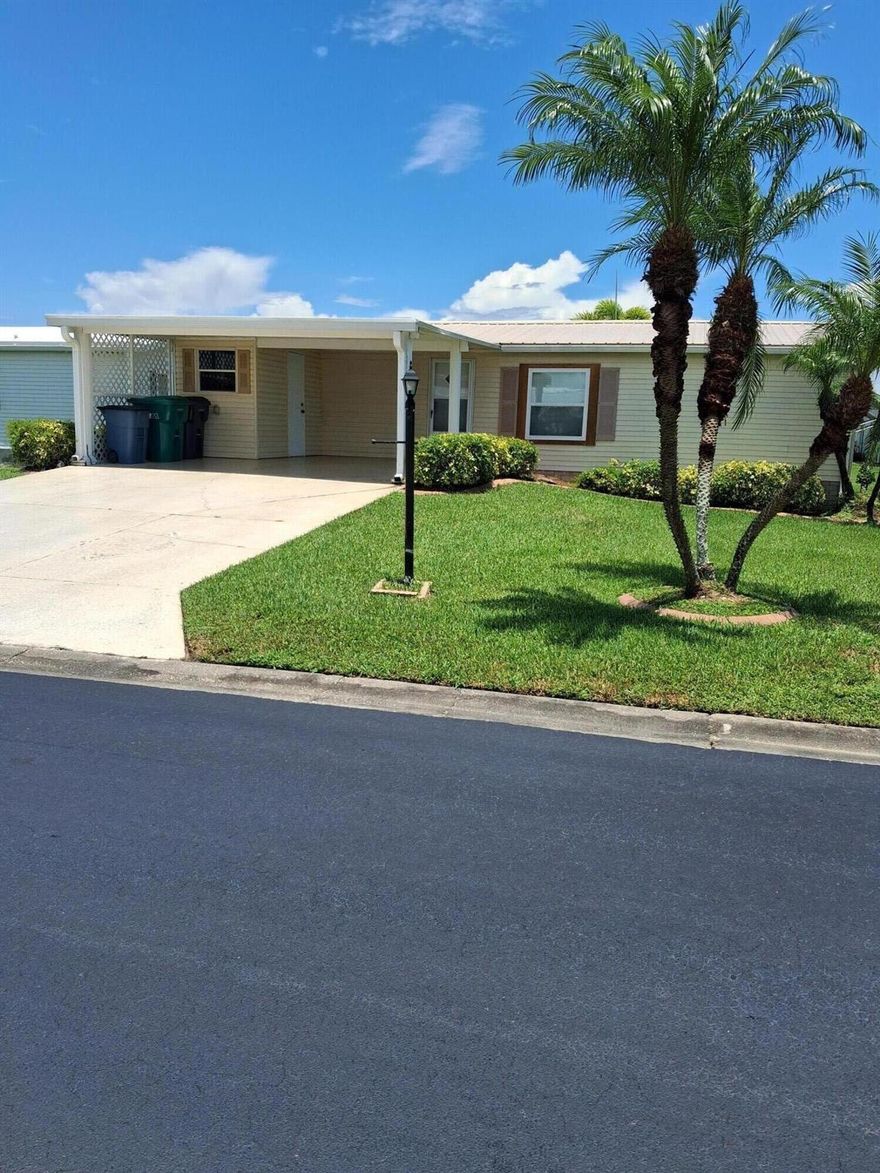 SEMINOLE COVE 2/2, partially furnished with 2 Master Suites and large closets.  All the appliances are less than 2 years old (except stove that is 4 years old)  AC unit is 2 years old.  New windows. No steps to enter and covered carport for 2 vehicles.  Rear enclosed patio with vinyl windows.  Active retirement community that is close to shopping, restaurants and Lake Okeechobee.  Measure room sizes for accuracy
MAKE OFFER